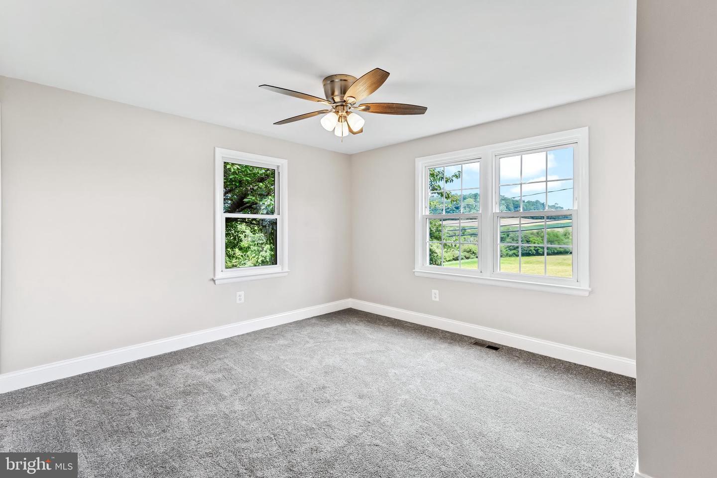105 Warfieldsburg Road Westminster, MD 21157 - Photo 13 of 34 Bright & airy room with scenic views main level br