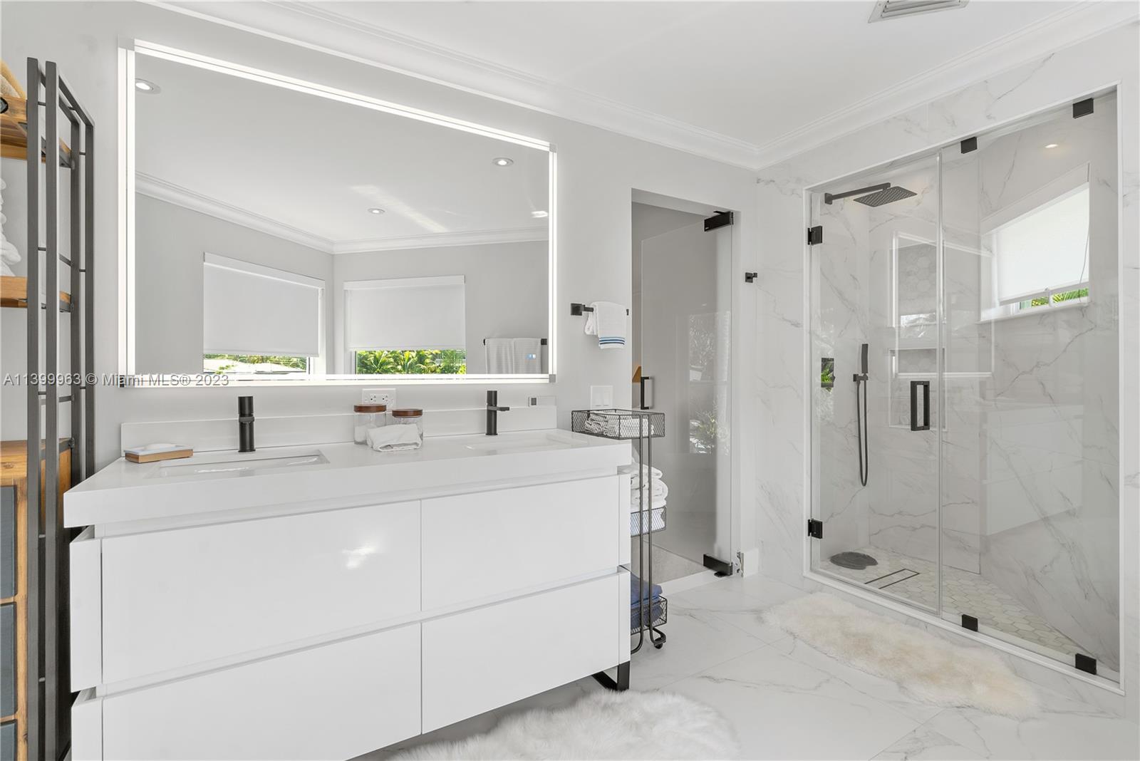 12521 Ramiro Street Coral Gables, FL 33156 - Photo 22 of 53 a room with a washing machine