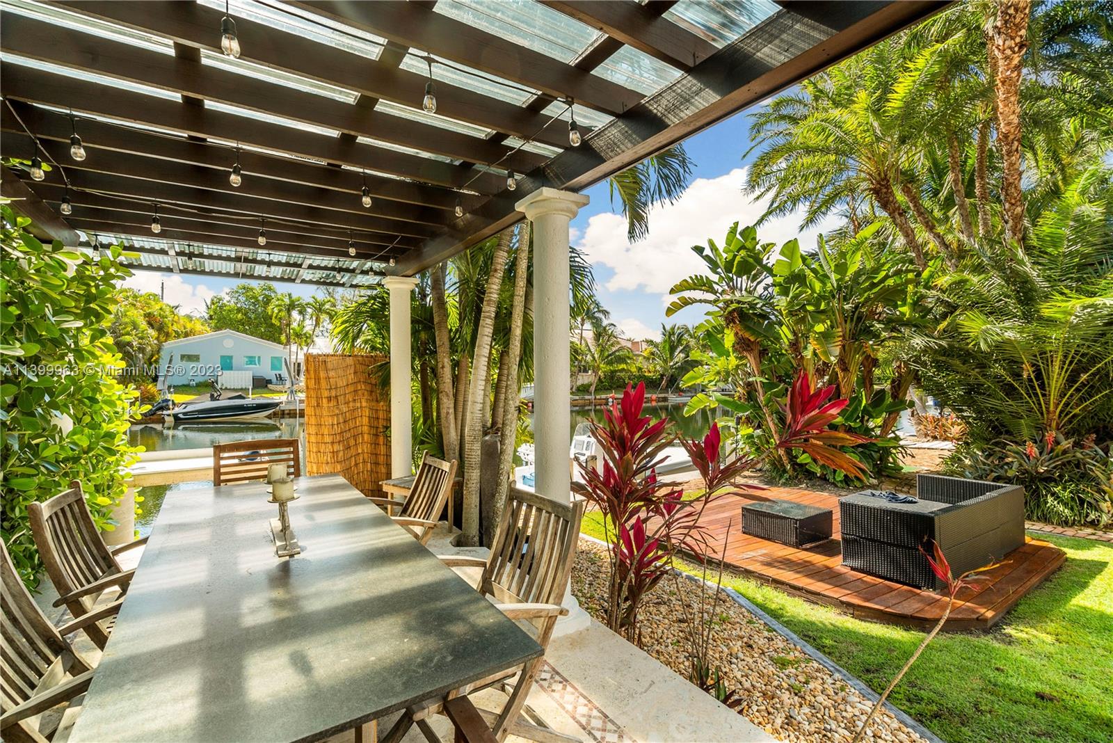 12521 Ramiro Street Coral Gables, FL 33156 - Photo 34 of 53 a view of an outdoor space with seating
