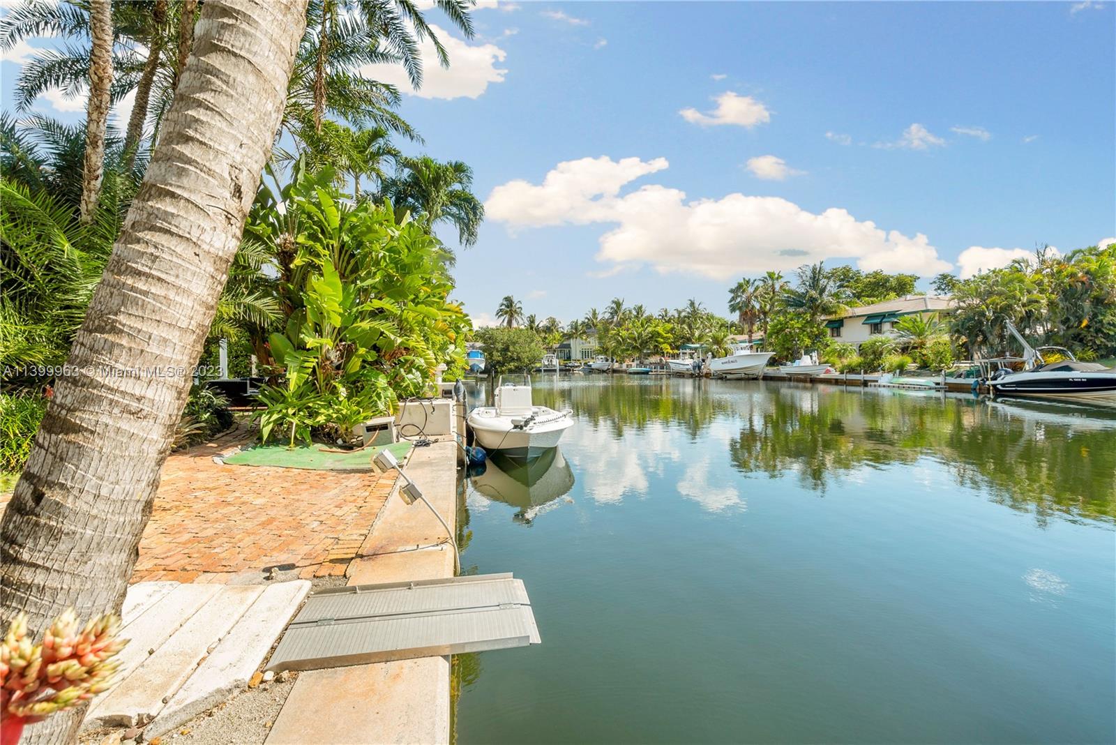 12521 Ramiro Street Coral Gables, FL 33156 - Photo 47 of 53 a view of a lake with houses