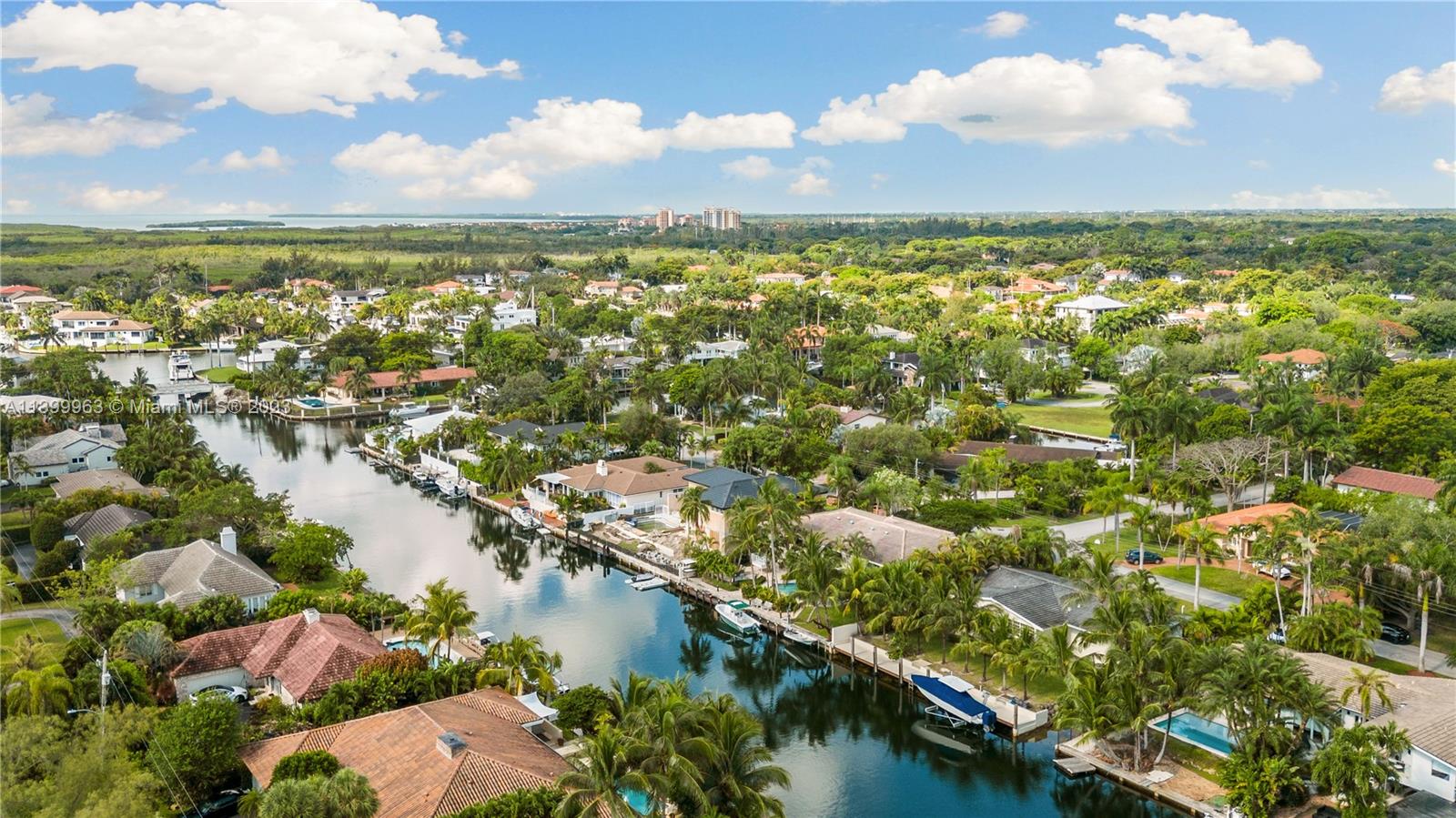 12521 Ramiro Street Coral Gables, FL 33156 - Photo 49 of 53 an aerial view of residential building and lake