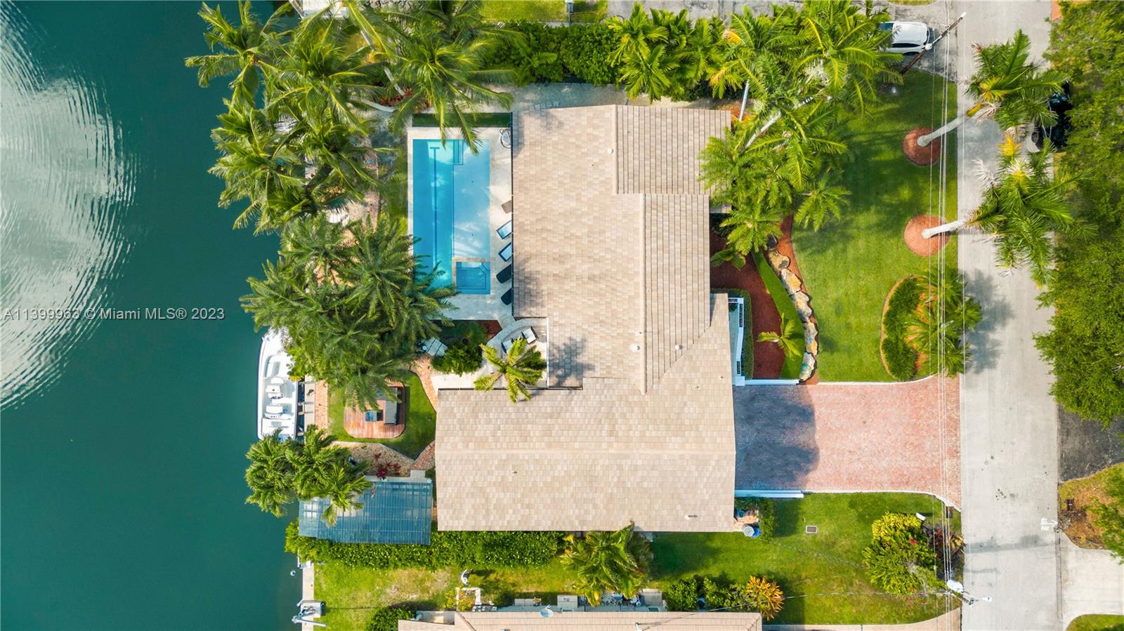12521 Ramiro Street Coral Gables, FL 33156 - Photo 5 of 53 an aerial view of a house with a yard and garden