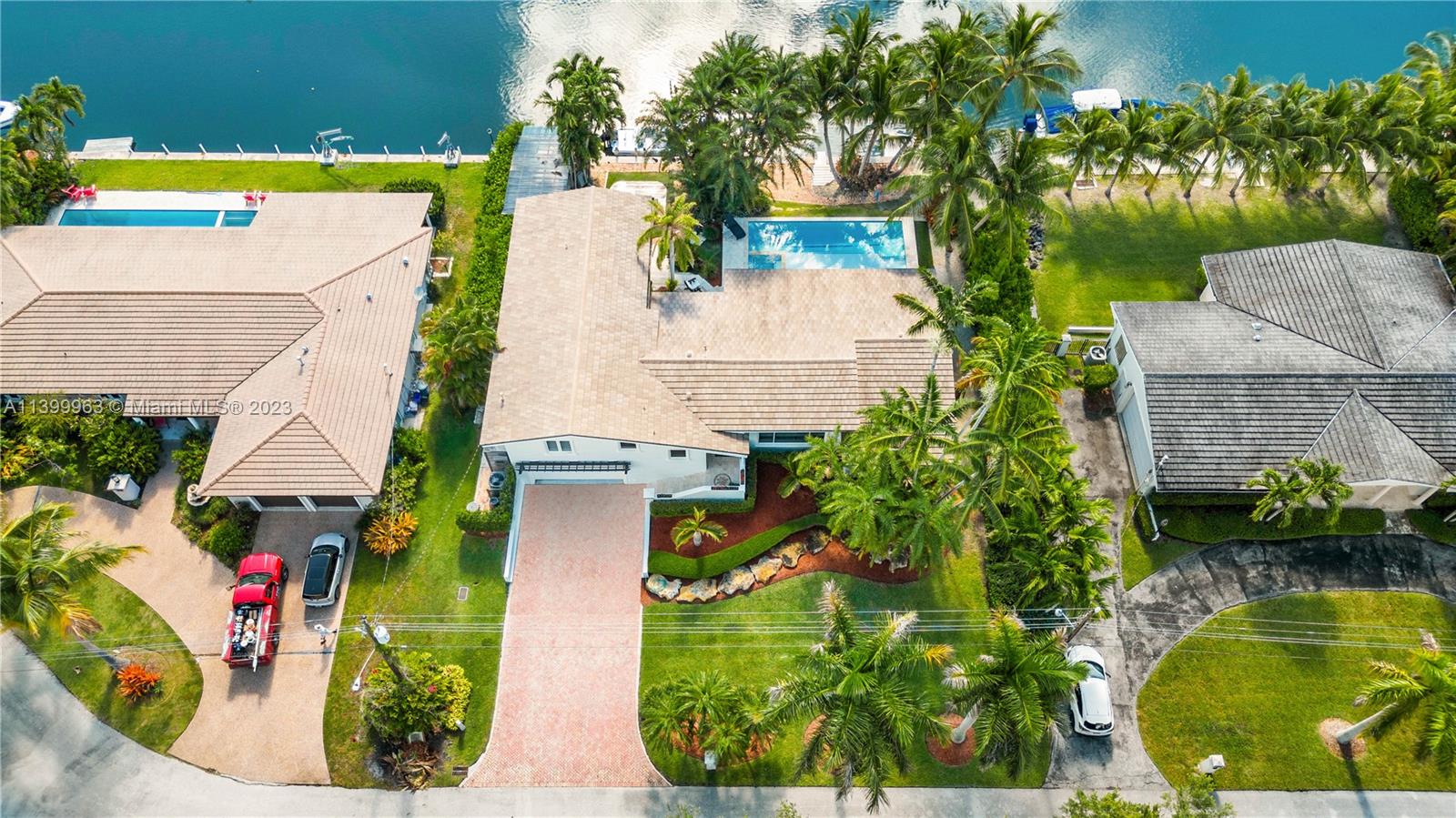 12521 Ramiro Street Coral Gables, FL 33156 - Photo 51 of 53 an aerial view of a house with a swimming pool
