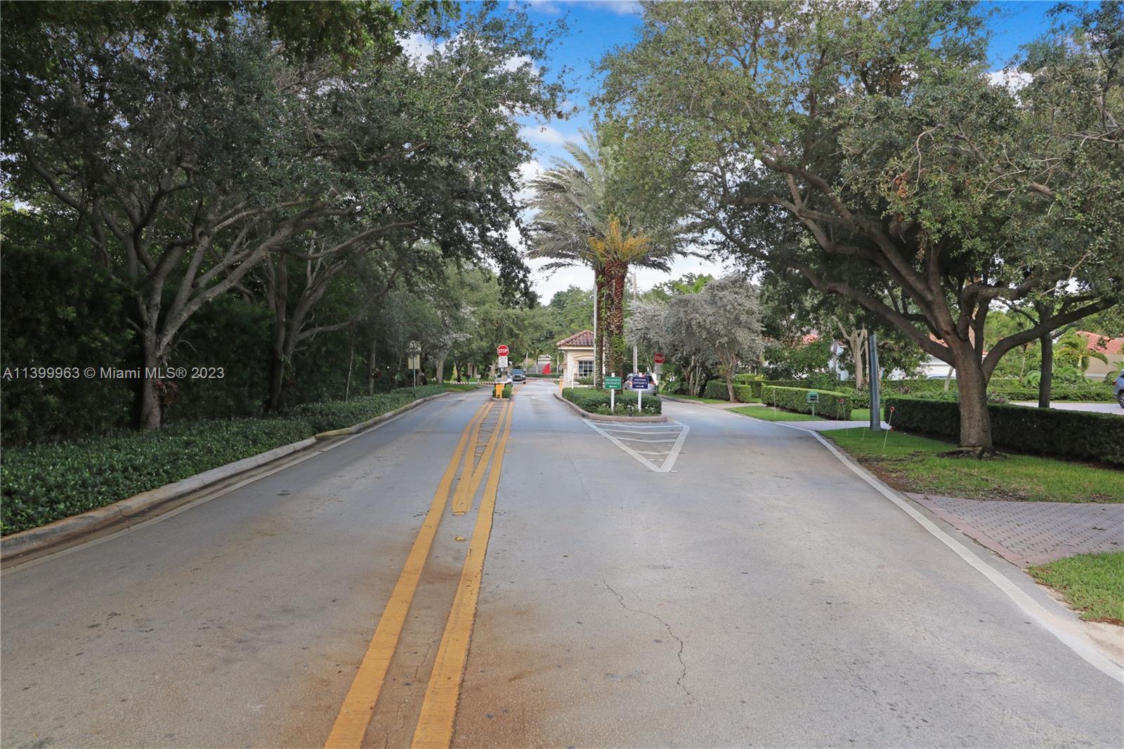 12521 Ramiro Street Coral Gables, FL 33156 - Photo 53 of 53 a view of a street with a houses