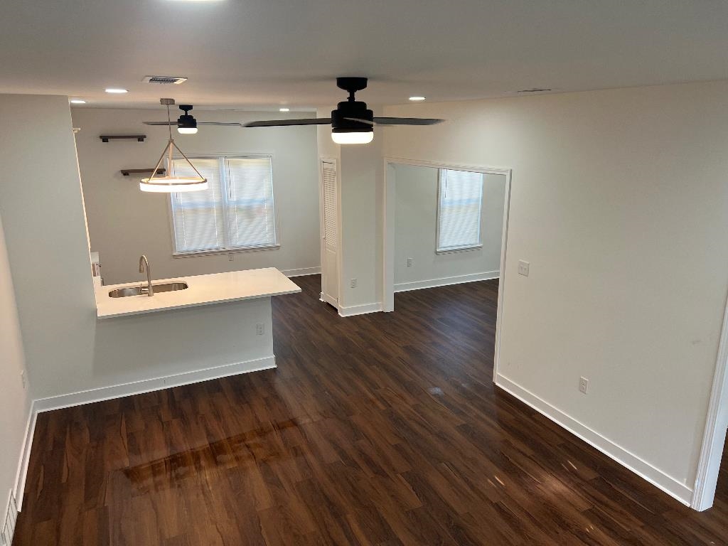 4566 Independent Road Bartlett, TN 38002 - Photo 6 of 23 Unfurnished living room with a ceiling fan, dark wood-style floors, and recessed lighting