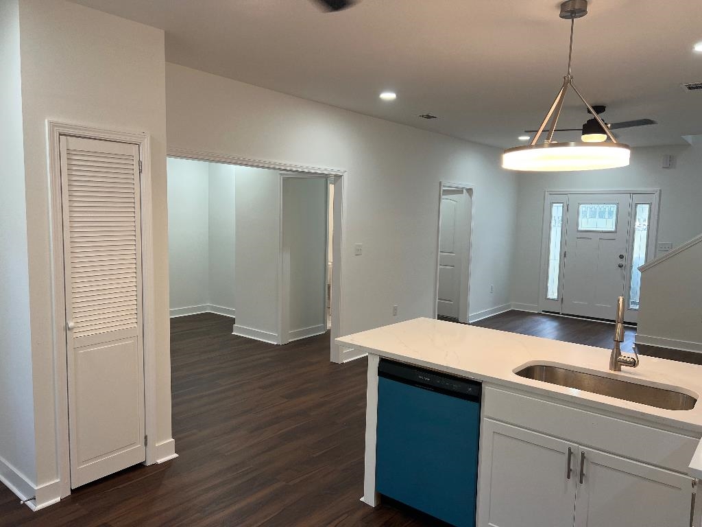 4566 Independent Road Bartlett, TN 38002 - Photo 9 of 23 Kitchen with dark wood-type flooring, dishwasher, recessed lighting, white cabinetry, and pendant lighting