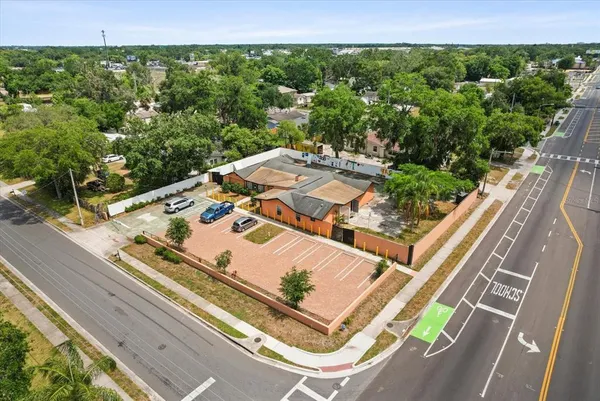a view of a balcony with floor to ceiling windows