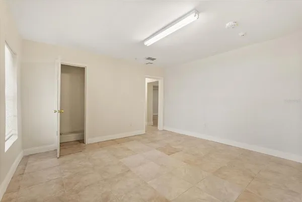 an empty room with an entryway
