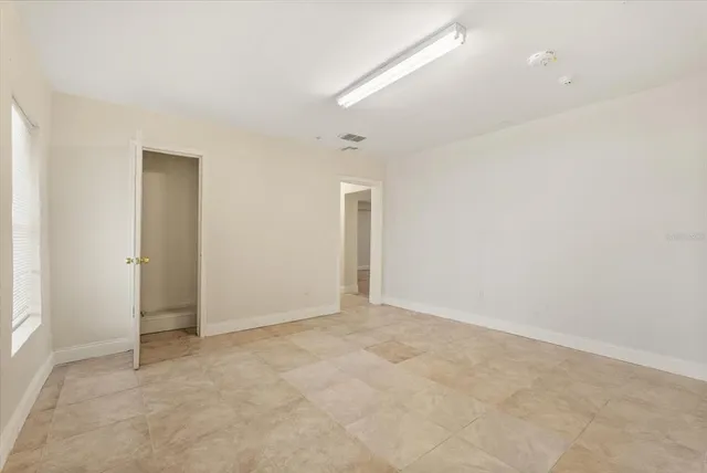 an empty room with an entryway
