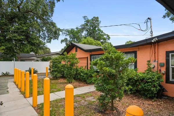 a backyard of a house with lots of green space