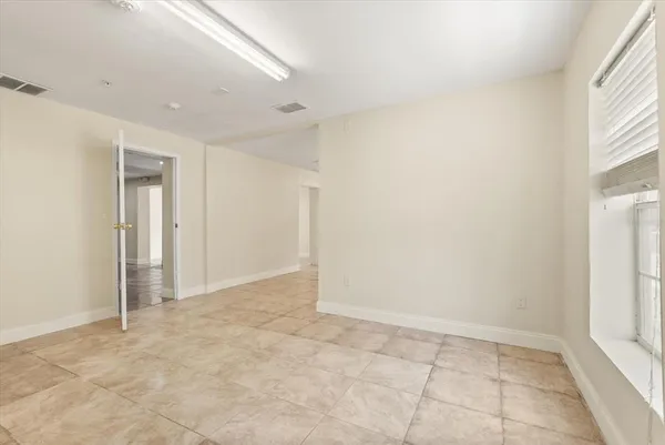 an empty room with a natural light