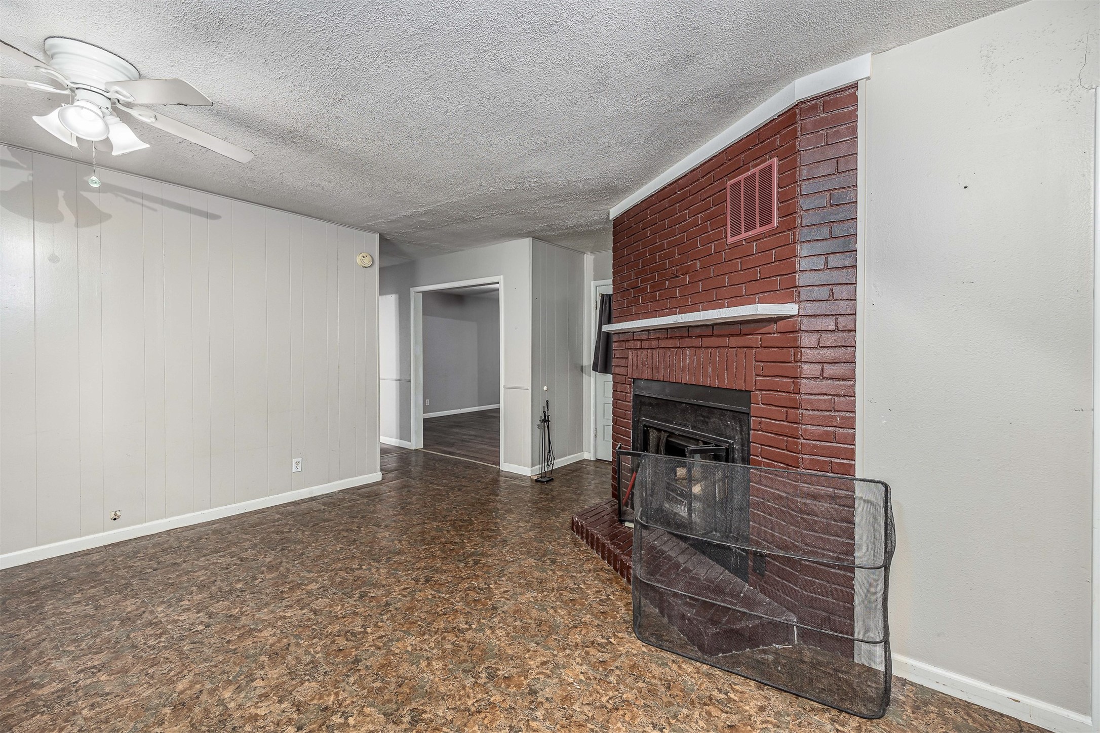 502 Massey Tompkins Road Baytown, TX 77521 - Photo 11 of 32 a view of a livingroom with a fireplace