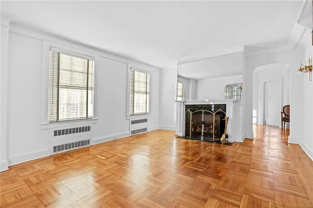 a view of a livingroom with furniture and a window