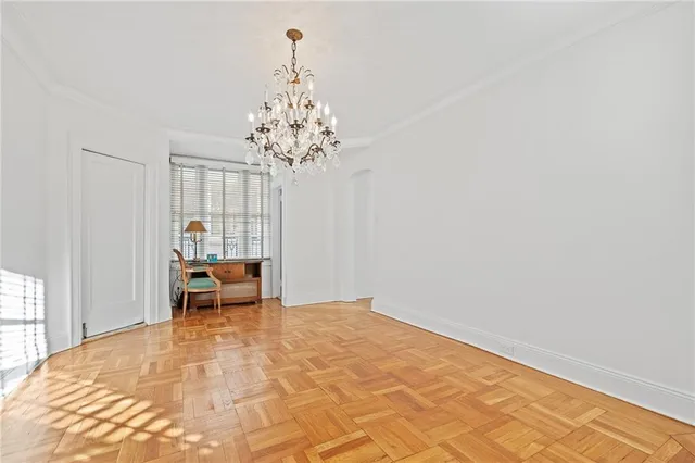 a view of a livingroom with a dinning table and chair