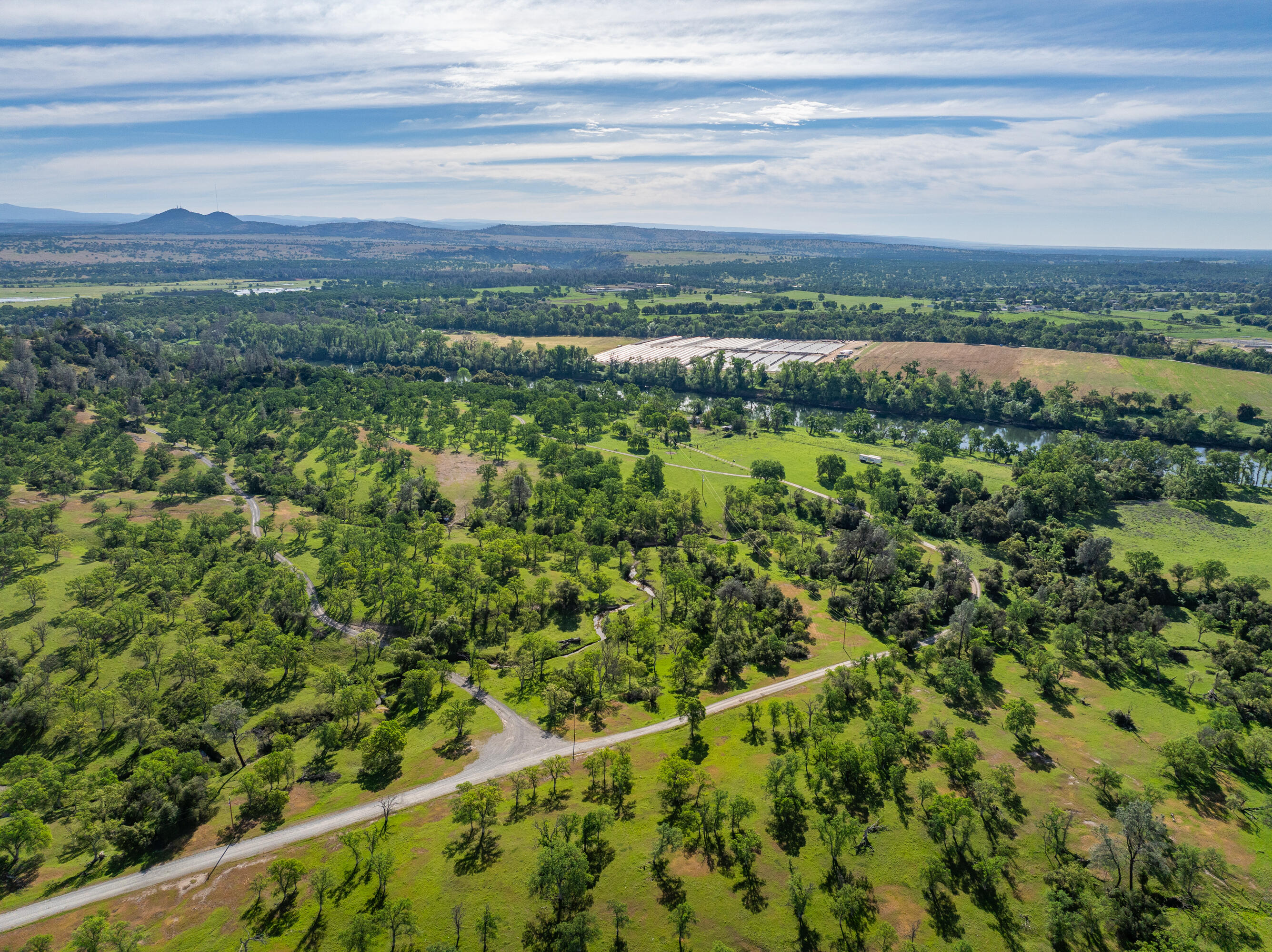 22090 Forbes Way Red Bluff, CA 96080 - Photo 14 of 28 a view of city with lush green forest
