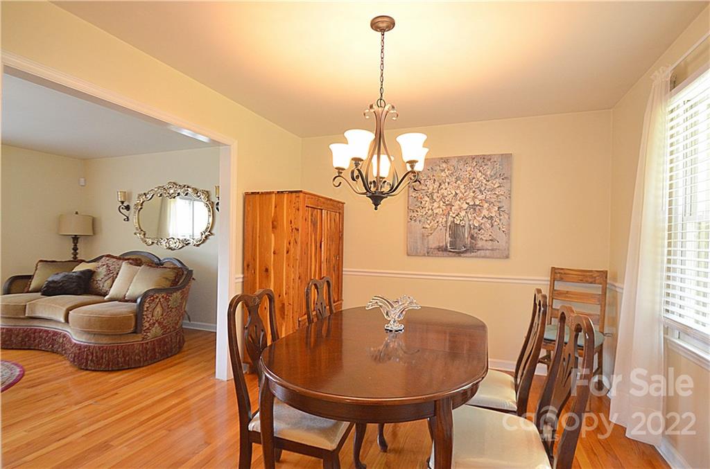 7433 Riding Trail Road Charlotte, NC 28212 - Photo 13 of 42 a view of a dining room with furniture window and outside view