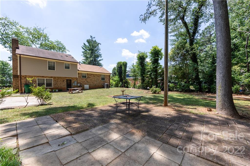 7433 Riding Trail Road Charlotte, NC 28212 - Photo 38 of 42 a view of a house with backyard and a tree