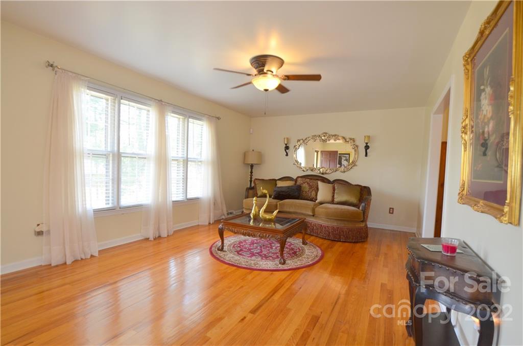 7433 Riding Trail Road Charlotte, NC 28212 - Photo 5 of 42 a living room with furniture and a window