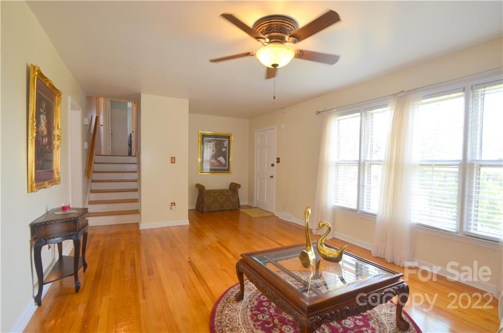 7433 Riding Trail Road Charlotte, NC 28212 - Photo 8 of 42 a living room with furniture and a window