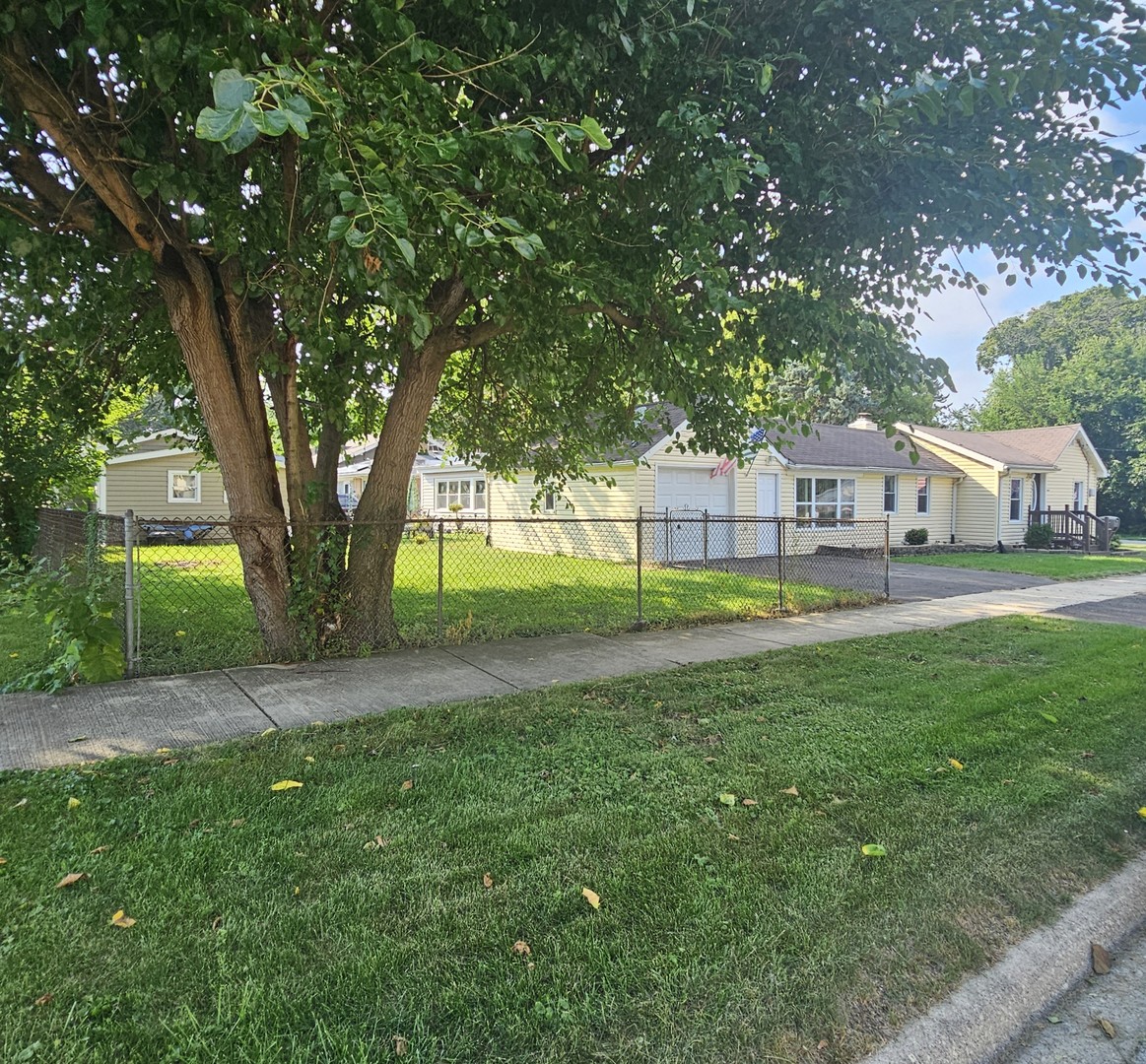 900 Charles Street Aurora, IL 60506 - Photo 13 of 14 a view of a house with a big yard