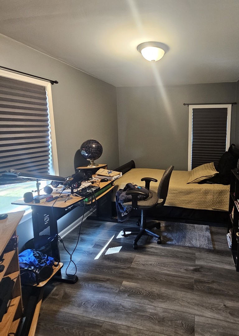 900 Charles Street Aurora, IL 60506 - Photo 7 of 14 a room with furniture pool table and a window