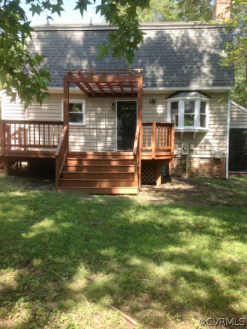 9713 Kendrick Road Richmond, VA 23236 - Photo 2 of 11 a view of a house with a yard