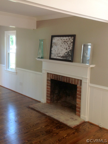 9713 Kendrick Road Richmond, VA 23236 - Photo 3 of 11 a living room with a fireplace