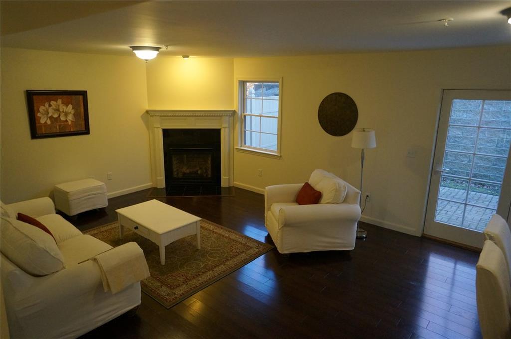 120 Starbird Road, Unit 11 Portland, ME 04102 - Photo 11 of 26 Large family room on 1st floor with...