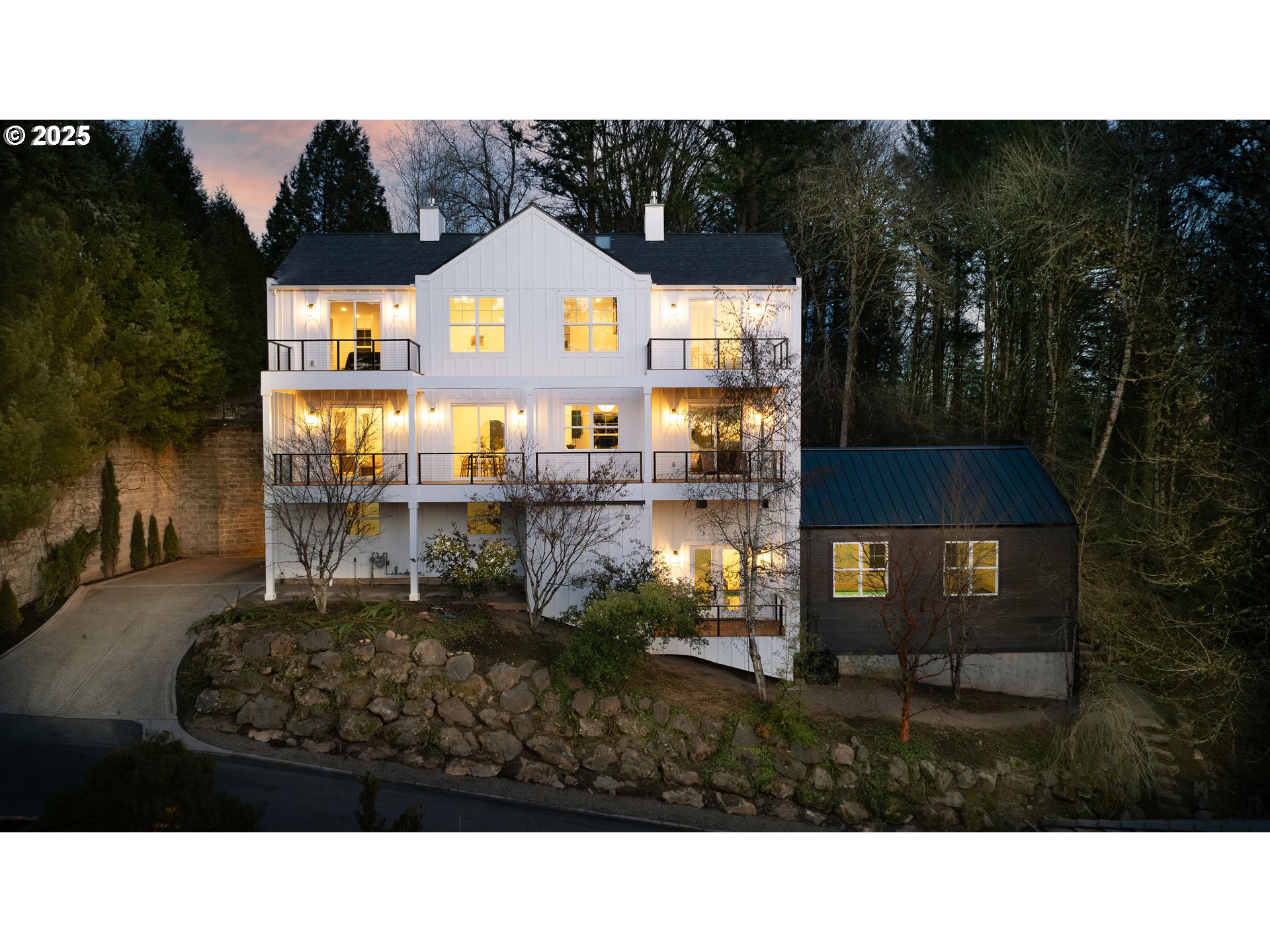290 Southwest Moonridge Place Portland, OR 97225 - Photo 1 of 46 a black and white photo of a house