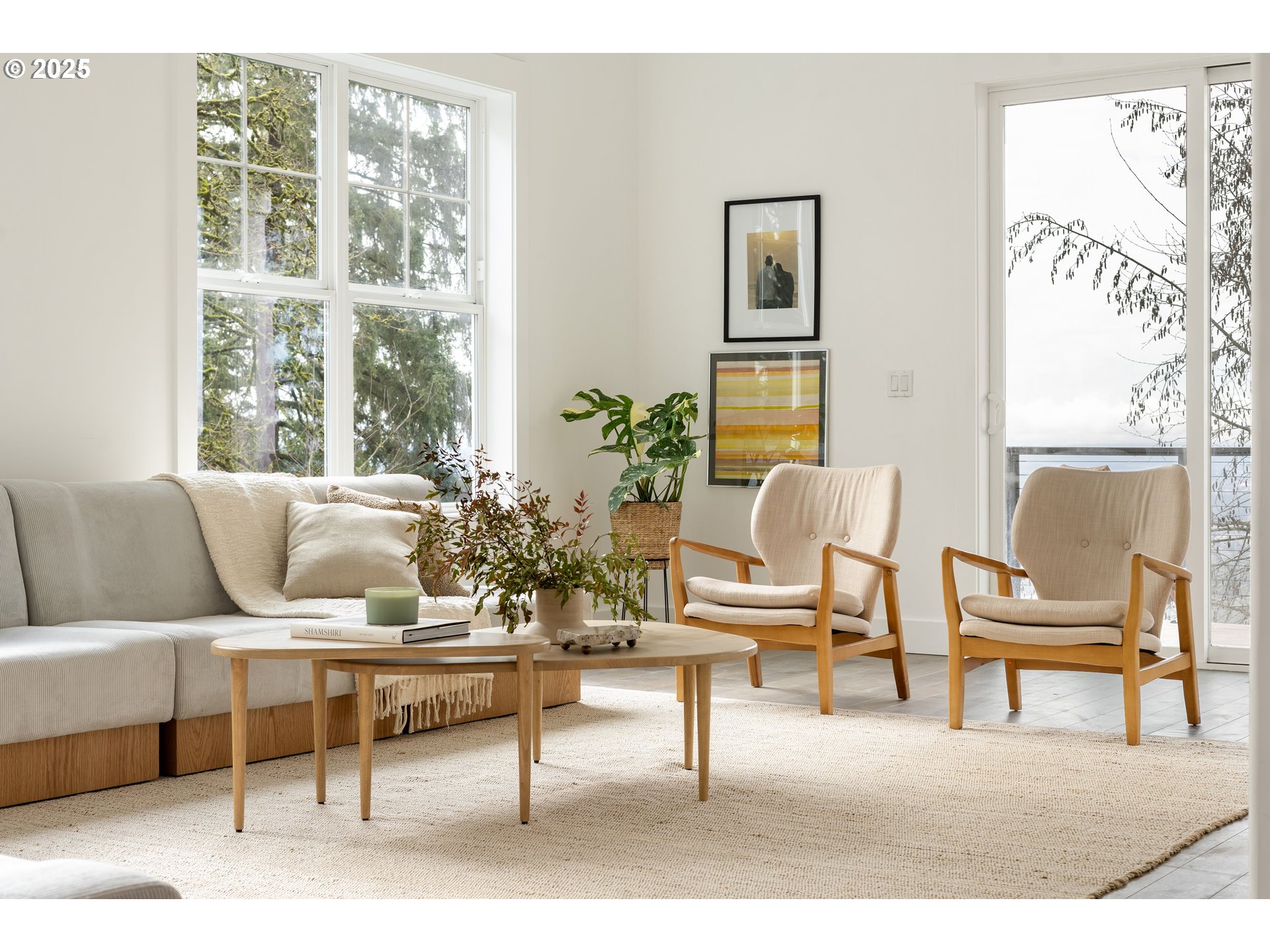 290 Southwest Moonridge Place Portland, OR 97225 - Photo 13 of 46 a living room with furniture and a large window