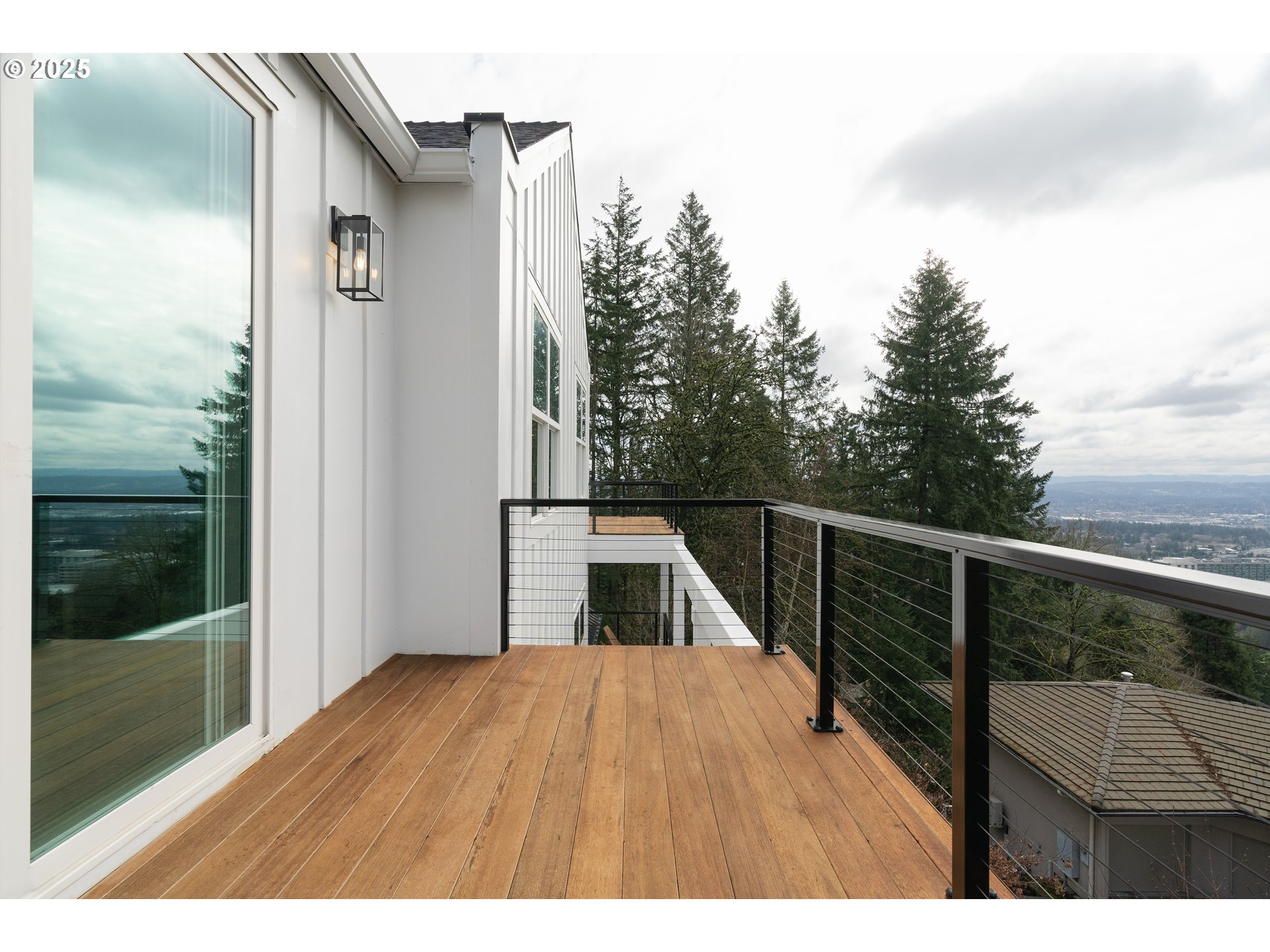 290 Southwest Moonridge Place Portland, OR 97225 - Photo 17 of 46 a view of balcony with wooden floor