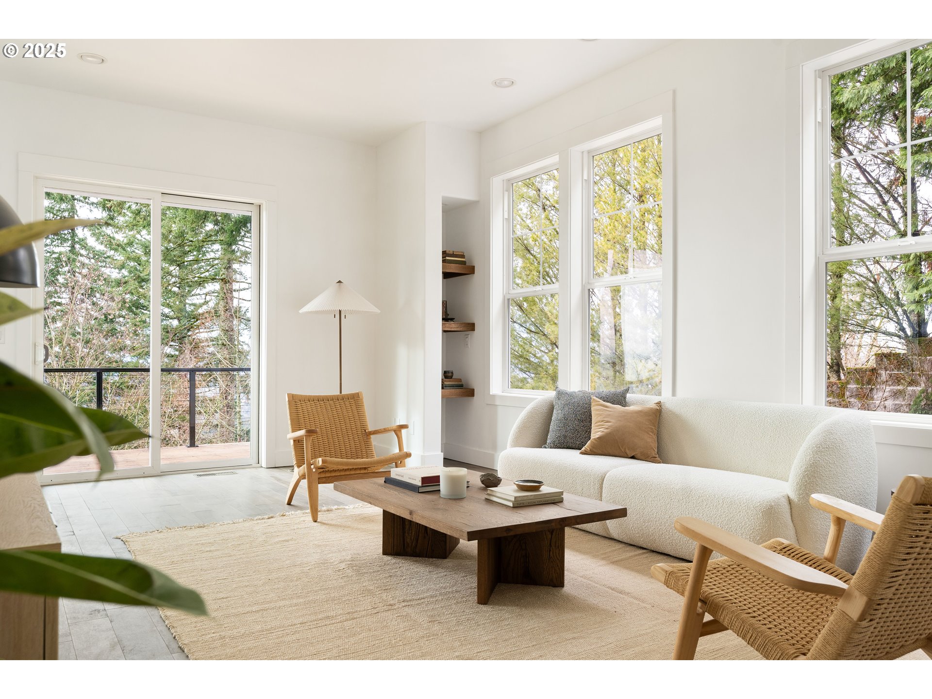 290 Southwest Moonridge Place Portland, OR 97225 - Photo 2 of 46 a living room with furniture and a large window