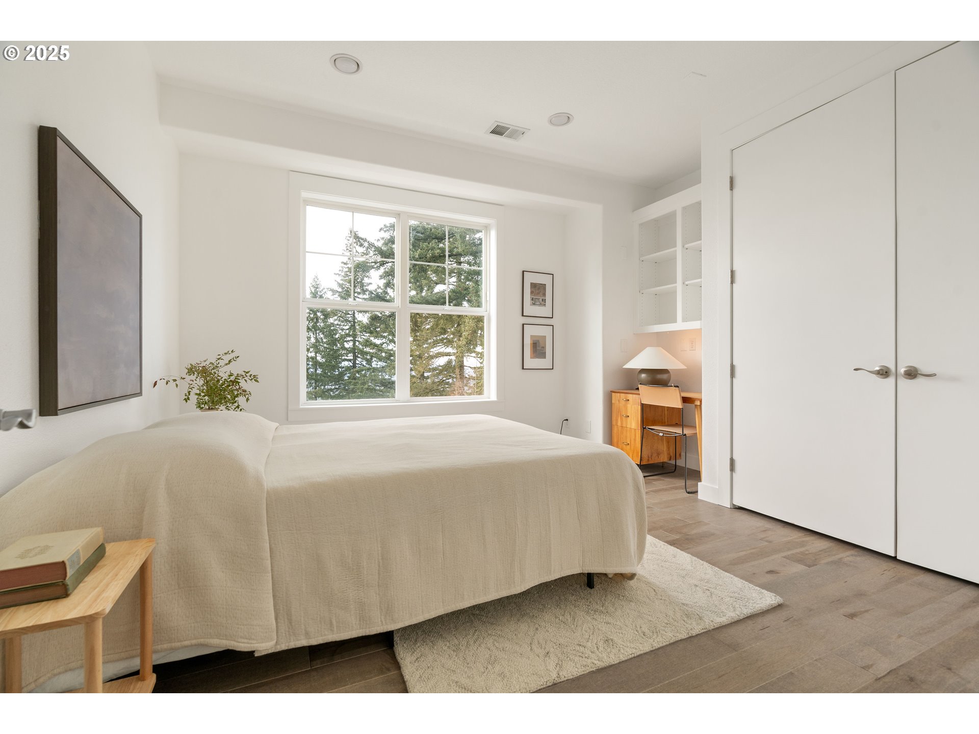 290 Southwest Moonridge Place Portland, OR 97225 - Photo 26 of 46 a bedroom with a bed and a window