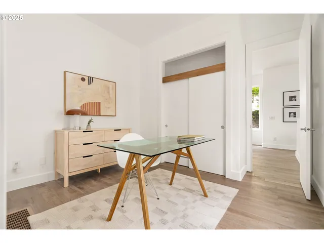 a view of a workspace with furniture