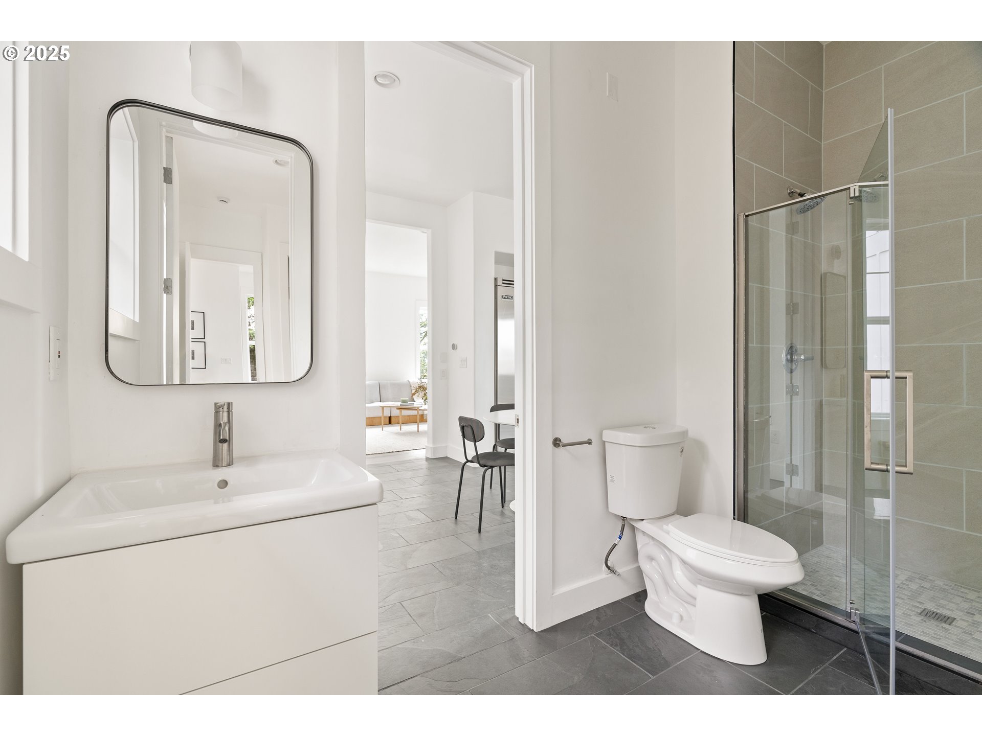 290 Southwest Moonridge Place Portland, OR 97225 - Photo 30 of 46 a bathroom with a toilet sink and shower