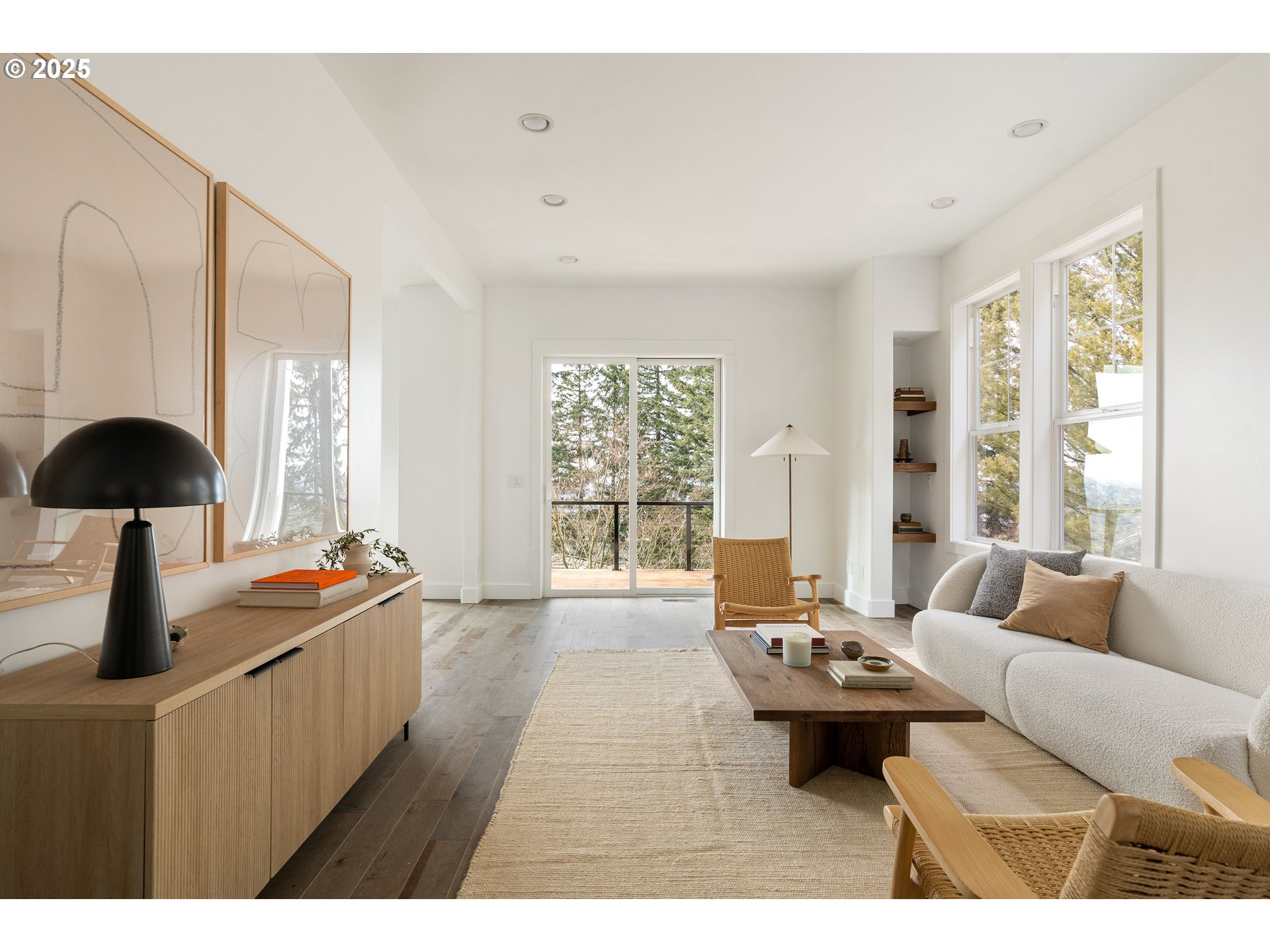 290 Southwest Moonridge Place Portland, OR 97225 - Photo 3 of 46 a living room with furniture and a large window