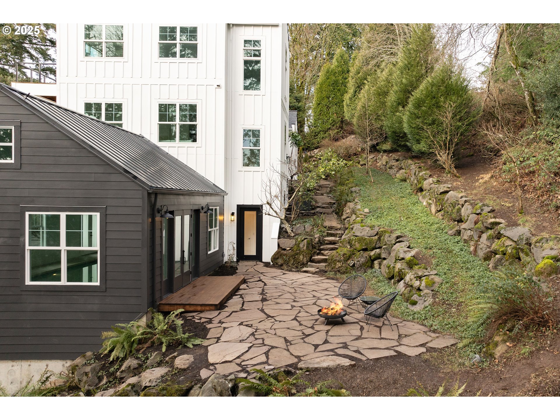 290 Southwest Moonridge Place Portland, OR 97225 - Photo 38 of 46 a view of a porch with plants and wooden fence