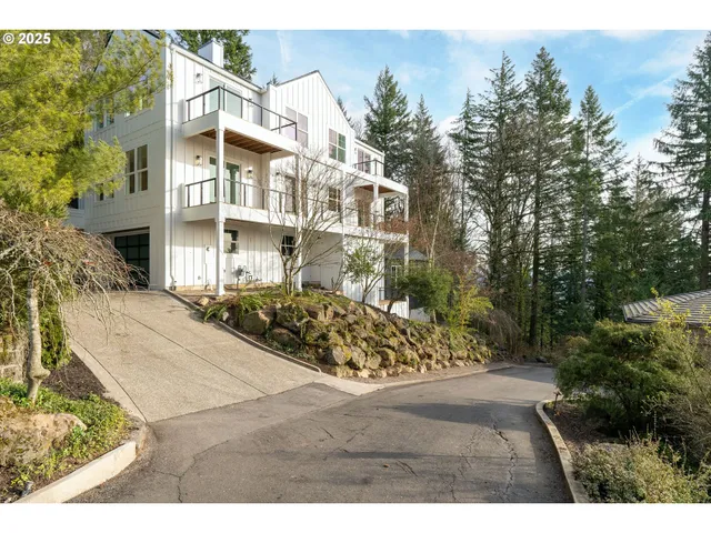a view of a street with a building in the background