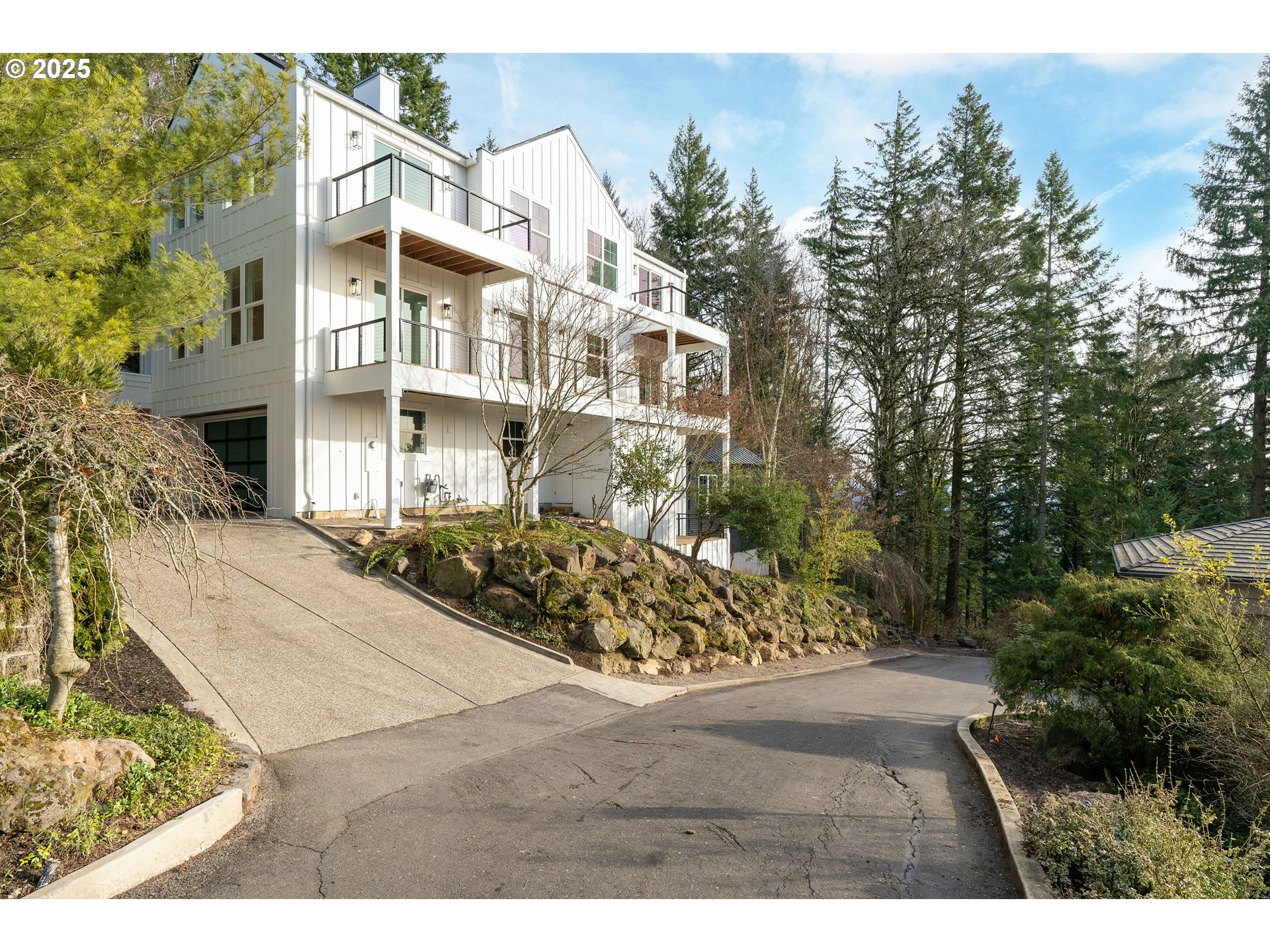 290 Southwest Moonridge Place Portland, OR 97225 - Photo 40 of 46 a view of a street with a building in the background