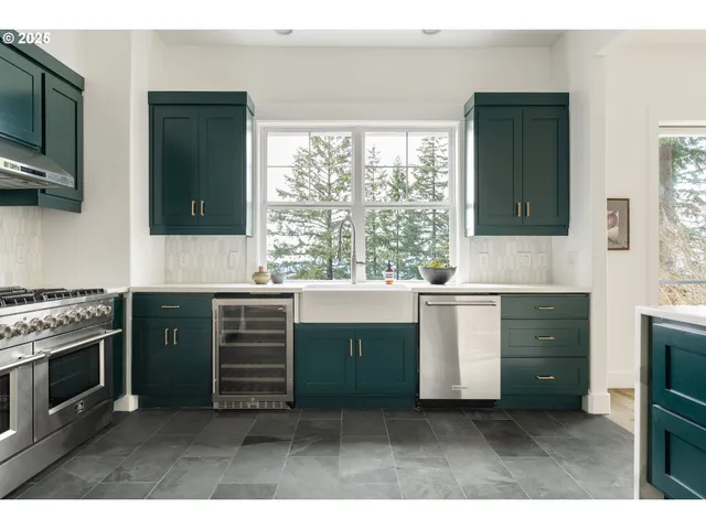 a kitchen with a stove and a microwave