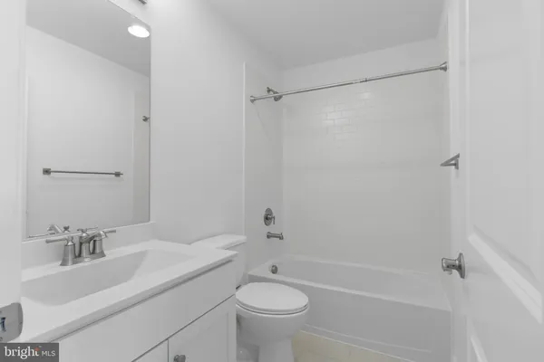 a view of a car parked in front of a building