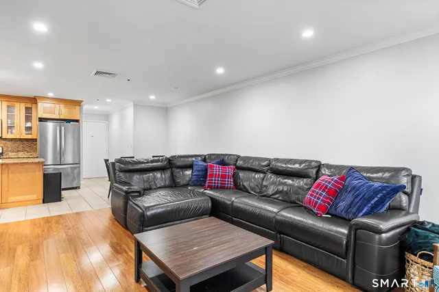 a view of a balcony with furniture