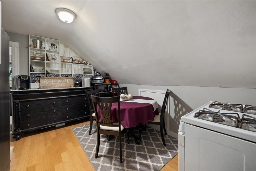 89-91 East Street Mansfield, MA 02048 - Photo 24 of 38 a kitchen with a stove and a refrigerator