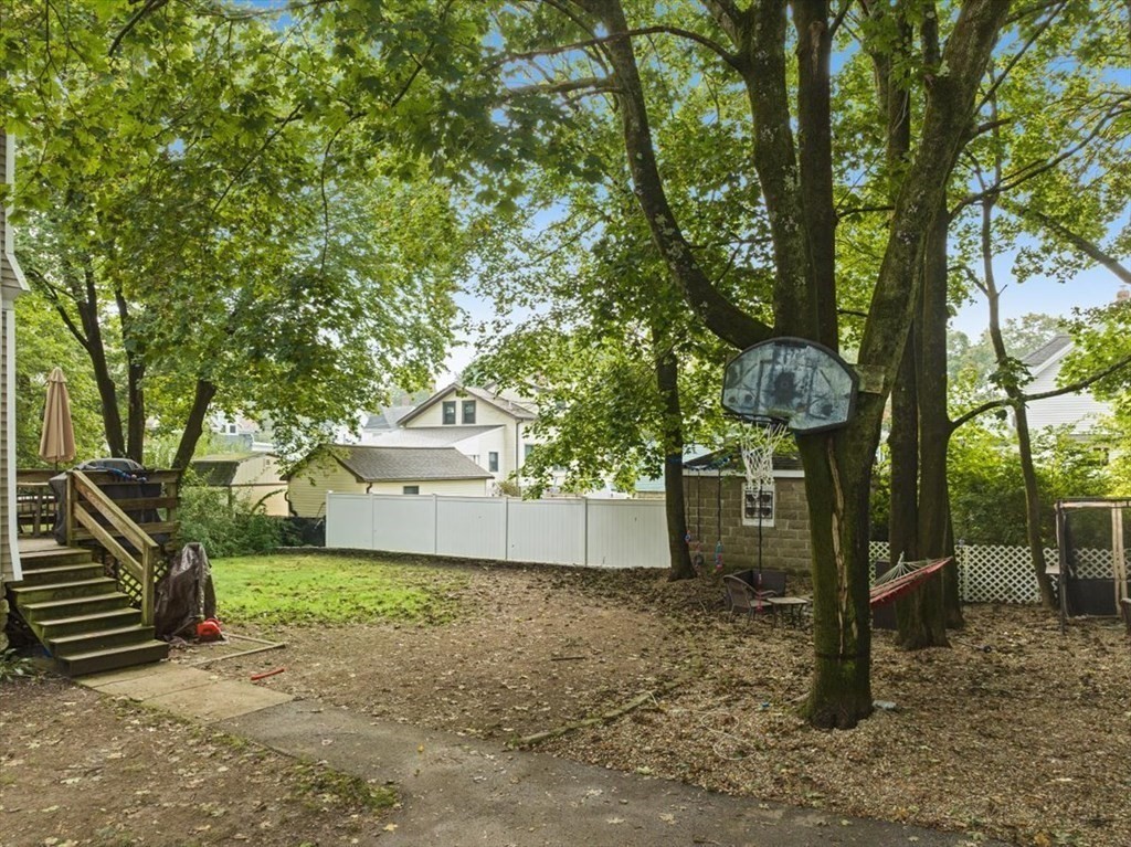 89-91 East Street Mansfield, MA 02048 - Photo 30 of 38 a front view of a house with a yard