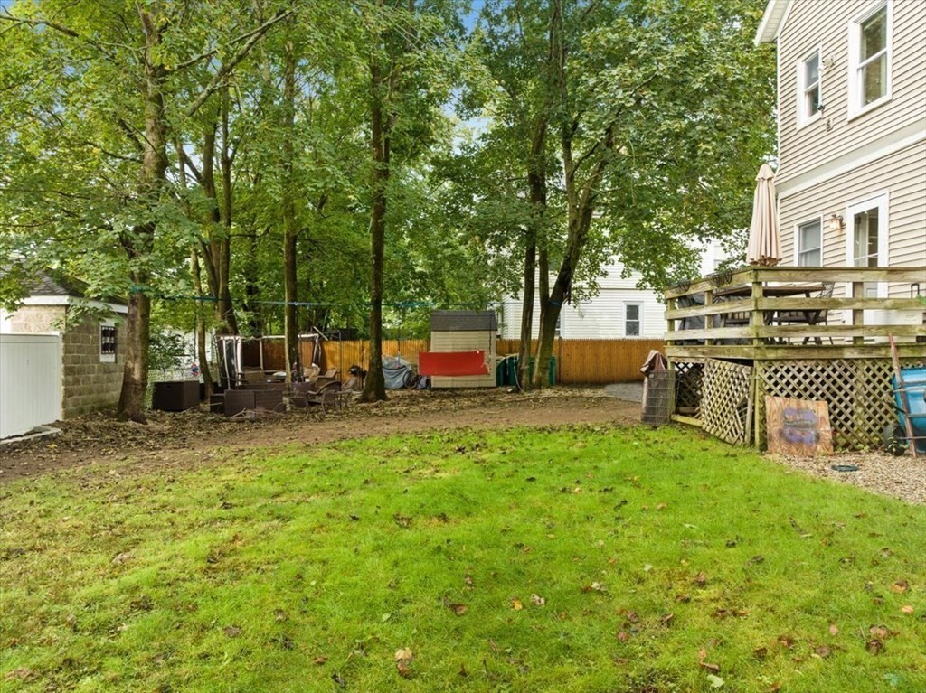 89-91 East Street Mansfield, MA 02048 - Photo 33 of 38 a view of a house with backyard and a tree