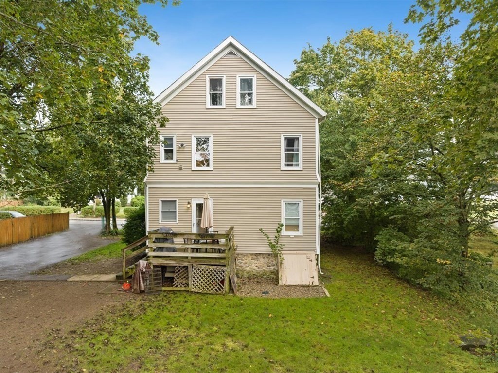 89-91 East Street Mansfield, MA 02048 - Photo 34 of 38 a view of a house with backyard and garden