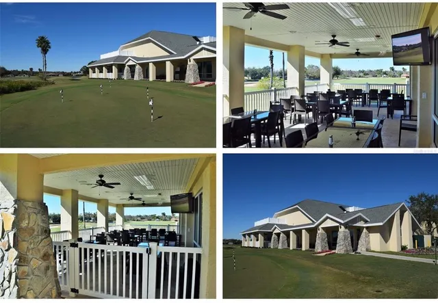 an aerial view of residential houses with outdoor space and river