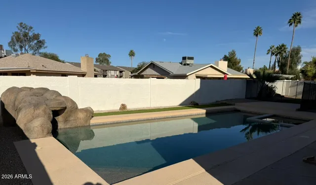 a view of balcony with furniture