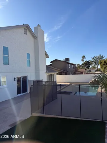 a view of a back yard of the house