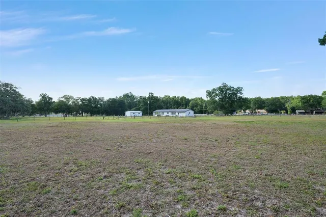 a view of an outdoor space and a yard